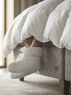 DUX Daunenschuhe – federleichter Komfort, praktisch verpackt