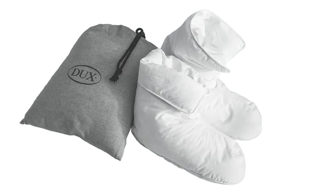 DUX Daunenschuhe – federleichter Komfort, praktisch verpackt